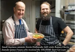  ?? ?? Small-business minister Kevin Hollinrake (left) visits Ramen Electra founder James Fraser, who received the 100,000th Start Up Loan