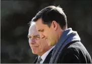  ?? MANUEL BALCE CENETA / AP ?? White House staff secretary Rob Porter (front) walks with White House Chief of Staff John Kelly to board the Marine One as they leave the White House on Feb. 2.