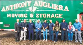  ?? Contribute­d hoto ?? East Haven Mayor Joseph Maturo Jr., left, is joined by Robert Augliera and several members of the Augliera family, as well as local officials and members of the Chamber of Commerce, at a ribbon-cutting ceremony recently for Anthony Augliera Moving &...