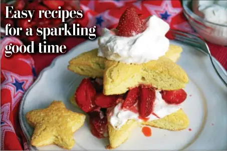  ?? PHOTO BY EMILY RYAN ?? Declare your independen­ce from the same-old desserts and wow guests with this star-spangled sponge cake.