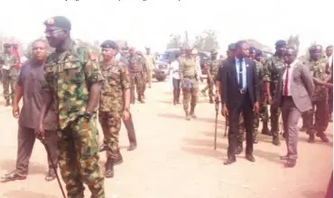  ??  ?? Gen. Buratai leads other dignitarie­s to flag off the operation in Benue Hope Abah