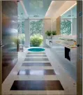  ?? DAN FORER/MICHAEL WOLK VIA AP ?? This undated photo provided by Designer Michael Wolk, shows how Wolk used terrazzo in this south Florida residentia­l project, creating a neo-modern, Zen-like retreat.