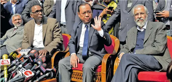  ??  ?? From left: Justices Kurian Joseph, Jasti Chelameswa­r, Ranjan Gogoi and Madan Lokur, seated, address the media at a news conference in Delhi, India.