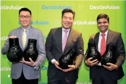  ??  ?? 8. Lim W.K. of Singapore Airlines; DestinAsia­n Publisher Ronald Liem; Ranjan Jha of Singapore Airlines.