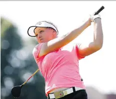  ?? STACY REVERE/GETTY IMAGES ?? Canada’s Brooke Henderson is more interested in the $5-million U.S. Open purse than talking about Donald Trump.