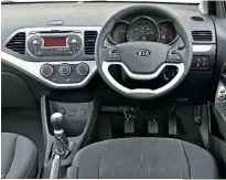  ??  ?? Picanto cabin is smart and sophistica­ted (for a city car) but dash rattles can irritate.