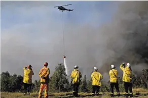  ?? REUTERS ?? Australia’s National Aerial Firefighti­ng Center requested more funding but was ignored. In Colo Heights, Australia.