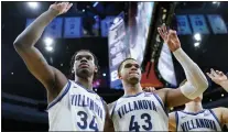  ?? MATT SLOCUM — THE ASSOCIATED PRESS ?? Villanova’s Eric Dixon, right. and Brandon Slater celebrate on Saturday at the Wells Fargo Center.