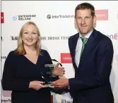  ??  ?? EPS managing director Patrick Buckley and EPS communicat­ions manager Sara McMahon with the Manufactur­ing and Engineerin­g trophy at the Energia Family Business Awards.