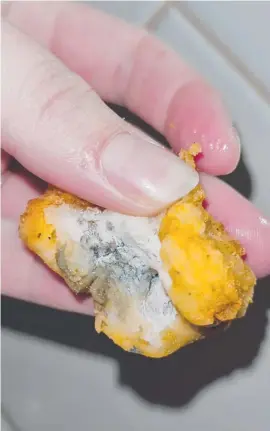  ?? ?? MOULD: A mum was horrified when she found what she suspected was green mould in chicken nuggets purchased from a Toowoomba KFC.