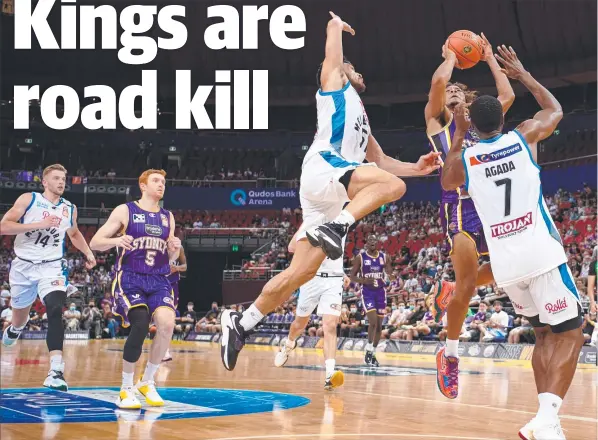  ?? ?? The Kings’ Indigenous star Biwali Bayles drives towards the basket against Melbourne United at Qudos Bank Arena on Sunday. Picture: Getty Images