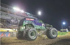  ?? Provided by Monster Jam, ?? Fan favorite Grave Digger pounds the dirt at a previous Monster Jam outdoor event. The brand is expanding its Colorado presence in April.