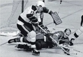  ?? CANADIAN PRESS FILE PHOTO ?? Andre Boudrias (15), pictured with the Minnesota North Stars in 1968, was one of the Vancouver Canucks’ first stars and a former team captain. Boudrias had 491 points over 662 NHL games with five NHL teams.