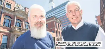  ??  ?? >
Stuart Thomas (left) and Tony Cosgrove outside Masgroves’ office in Newhall Street, Birmingham