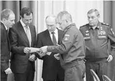  ??  ?? (From second left) Assad, Putin, Russian Defence Minister Sergei Shoigu and Chief of the General Staff of Russian Armed Forces Valery Gerasimov attend a meeting in the Black Sea resort of Sochi. — AFP photo