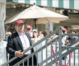  ?? CAROLYN KASTER/AP ?? President Donald Trump appears Sunday at the U.S. Women’s Open golf tournament.