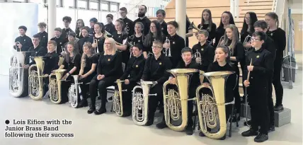  ??  ?? ● Lois Eifion with the Junior Brass Band following their success