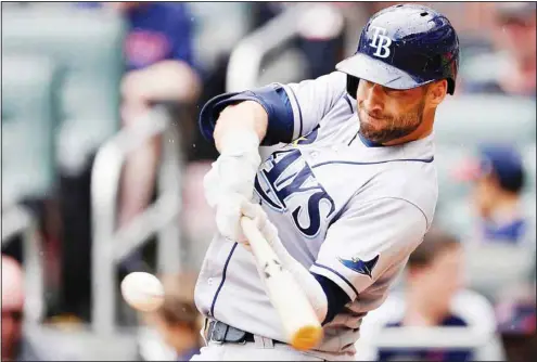  ??  ?? Tampa Bay Rays’ Kevin Kiermaier drives in a run with a double in the seventh inning of a baseball game against the Atlanta Braves, on July 18, in Atlanta. (AP)