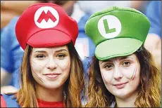  ??  ?? Italy fans wait for the start of the EURO 2016 round of 16 football match between Italy and Spain at the Stade de France Stadium in Saint-Denis, near Paris onJune 27.