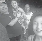  ?? SUBMITTED PHOTO ?? Aaron Suhang said members of his family shown in this photo died in a house fire early Monday on Linden Avenue in Akron.