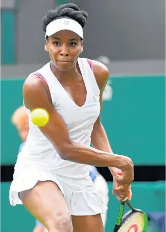  ?? Picture / AP ?? Venus Williams is rolling back the years and on the verge of a historic win — with or without pink bra straps which she refuses to talk about.
