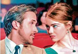  ??  ?? Ryan Gosling and Emma Stone in “La La Land”