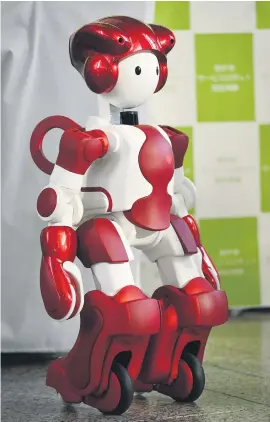  ??  ?? CUTIE. Humanoid robot EMIEW3 is displayed at the Tokyo Metropolit­an Government (TMG) building in Tokyo.