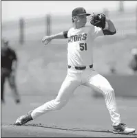  ?? The Associated Press ?? SUPER SINGER: Florida starting pitcher Brady Singer throws against Auburn during the first inning of last Saturday’s NCAA super regional in Gainesvill­e, Fla. Florida begins its repeat bid at the College World Series with a ‘very talented’ staff, two first-round draft picks, Singer and fellow starter Jackson Kowar, and All-American closer Michael Byrne.