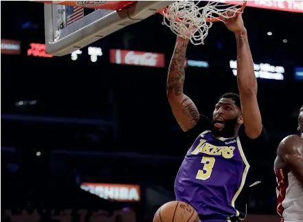  ?? AP ?? Los Angeles Lakers forward Anthony Davis dunks against the Miami Heat yesterday.