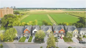  ?? KEVIN BELANGER PHOTOGRAPH­Y ?? Farmside Green by RND Constructi­on is a collection of nine net zero ready homes that back onto the Experiment­al Farm in Carlington.