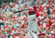  ?? JEFF ROBERTSON — THE ASSOCIATED PRESS ?? Odubel Herrera’s on base streak ended even though he finished a Phillies loss standing on second base. Jay Dunn explains how that’s possible.