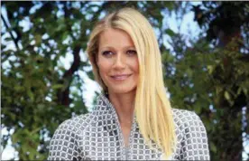  ?? THIBAULT CAMUS — THE ASSOCIATED PRESS FILE ?? In this file photo, Gwyneth Paltrow poses for photograph­ers before Chanel’s SpringSumm­er 2016 Haute Couture fashion collection in Paris.
