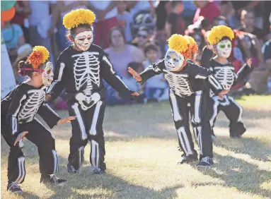  ?? PHOTOS BY MICHAEL CHOW/THE REPUBLIC ?? Dancers with Ballet Folklorico Quetzalli perform at the Día de Los Muertos PHX Festival.