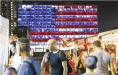  ?? — AFP photo ?? A picture shows the Tel Aviv city hall lit up in the colours of the American national flag to honour the victims of an attack in the American city of Las Vegas, at the Rabin Square in Tel Aviv.