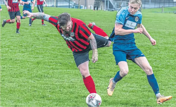  ?? ?? Sinnington, red and black kit, won 3-0 at home to Amotherby & Swinton Reserves in Beckett League Division Two on Saturday. PHOTO: BRIAN MURFIELD