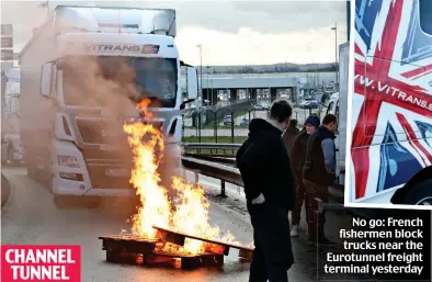  ?? ?? CHANNEL TUNNEL
No go: French fishermen block trucks near the Eurotunnel freight terminal yesterday