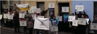  ??  ?? Members of the Sligo For Life group make their point at the constituen­cy office of Deputy Tony McLoughlin on John Street.