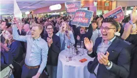  ?? CHRISTIAN CHARISIUS/DPA VIA AP ?? Supporters of the center-right CDU appeared headed to victory Sunday in Schleswig-Holstein, according to exit polls.