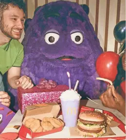  ?? MCDONALD'S ?? Grimace celebrates his 52nd birthday with a limited-edition shake.