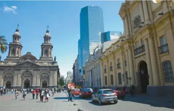  ?? DREAMSTIME ?? The Plaza de Armas is the symbolic heart of Chile’s bustling capital, Santiago.