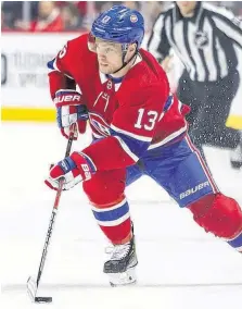  ?? POSTMEDIA NEWS ?? Canadiens’ Max Domi handles the puck during game against the Chicago Blackhawks in
Montreal on Jan. 15.