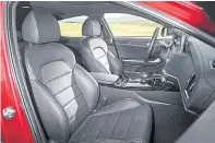 ??  ?? SPACING OUT: Head room is a touch limited in the second row, but leg room is very good and boot space both generous and accessible through the car’s ‘liftgate’ hatchback, above to below.