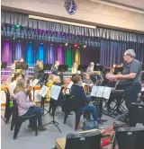  ?? Potpourri ?? Carpe Musicam! Orchestra and choir preparing for their first presentati­on of in Glenwood House’s auditorium.