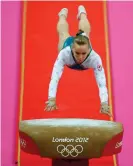  ?? Photograph: Mike Blake/Reuters ?? Elsabeth Black of Canada competes in the women’s gymnastics vault final at the London 2012 Olympic Games.