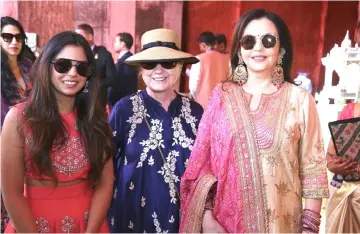  ??  ?? Hillary Clinton (centre) poses with Isha (left) and Isha’s mother Nita Ambani at Swadesh Bazaar, a curated showcase of traditiona­l Indian crafts and art forms, in Udaipur, in the desert state of Rajasthan, India, on Sunday. — Reliance Industries/Handout via Reuters