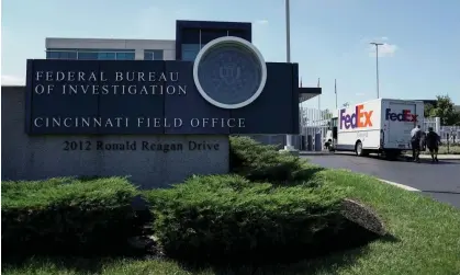  ?? Photograph: Jeffrey Dean/Reuters ?? A FedEx truck is inspected outside of the front gate of the FBI's Cincinnati field office.