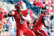  ?? GARY KAZANJIAN ?? Fresno State quarterbac­k Marcus Mcmaryion drops back to pass against Boise State during a NCAA college football game on Nov. 25 at Bulldog Stadium in Fresno.