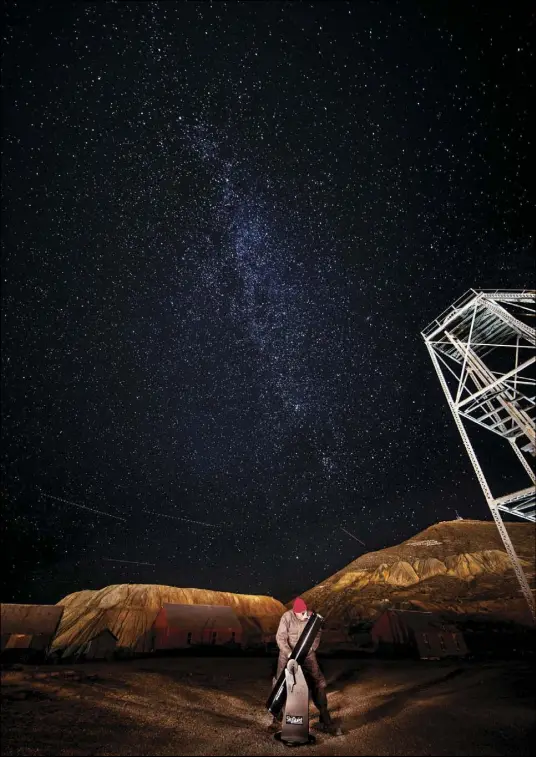  ?? L.E. Baskow Las Vegas Review-Journal @Left_Eye_Images ?? Stargazer Russ Gartz views the sky Oct. 30 from an isolated location at the Tonopah Historic Mining Park in Tonopah.