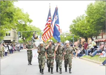  ?? Michael Cummo / For Hearst Connecticu­t Media file photos ?? Danbury’s annual Memorial Day parade in 2018. The parade began at the intersecti­on of Rose Street and Main Street, and ended with a ceremony at Rogers Park.