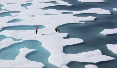  ?? PICTURE: REUTERS ?? Scientists work in the Arctic, in 2011. A team from the Arctic Council’s monitoring programme, claims the Arctic has been warming twice as fast as elsewhere.